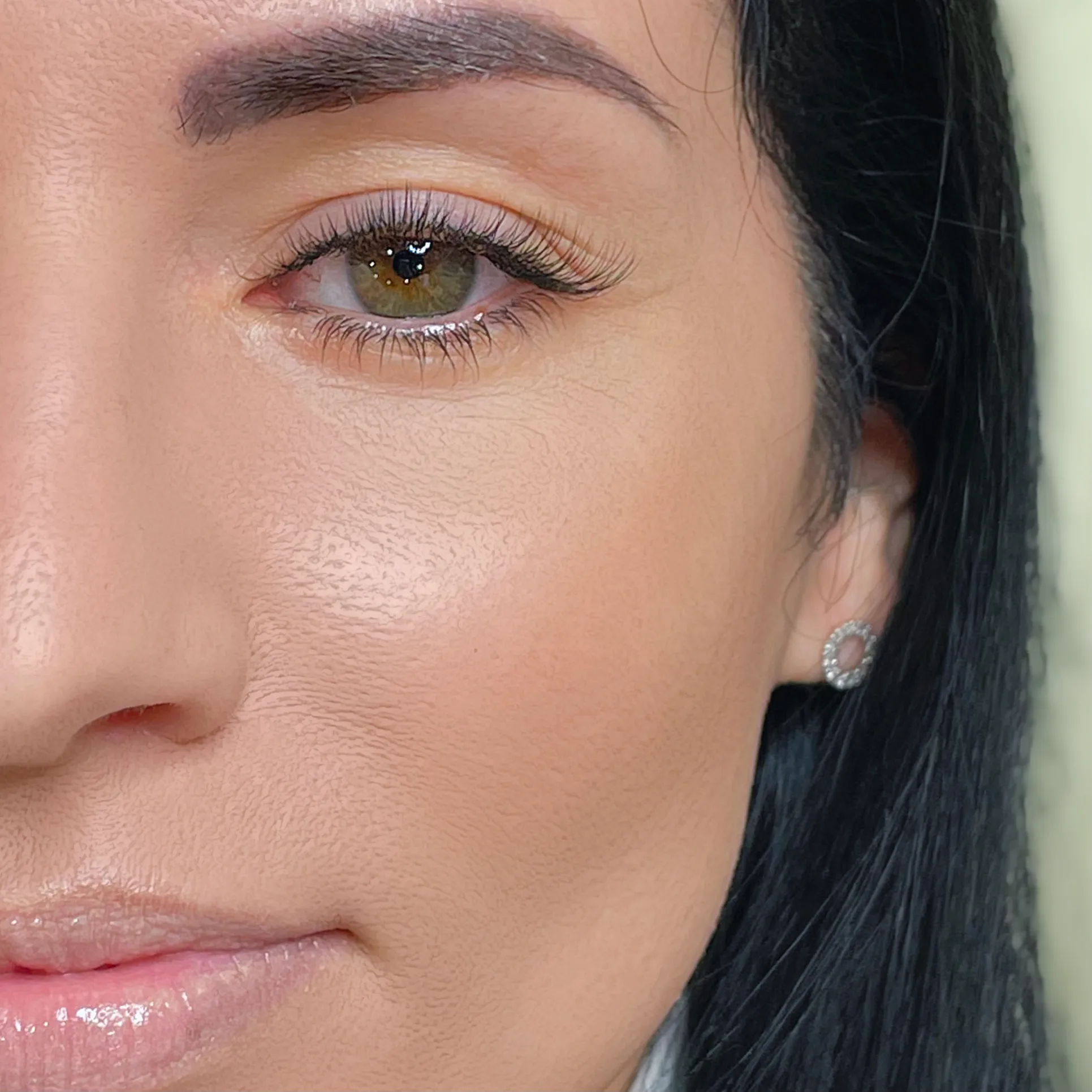 Close view of a client's eye with a clean Classic lash extension result.